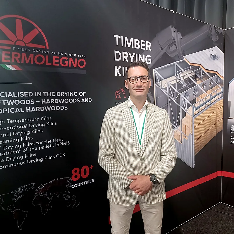 Termolegno representative presenting timber-drying kiln solutions at WoodEX 2026